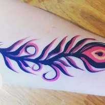 Fun face paint design by Sue