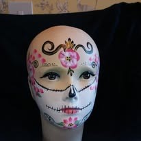 Fun face paint design by Sue